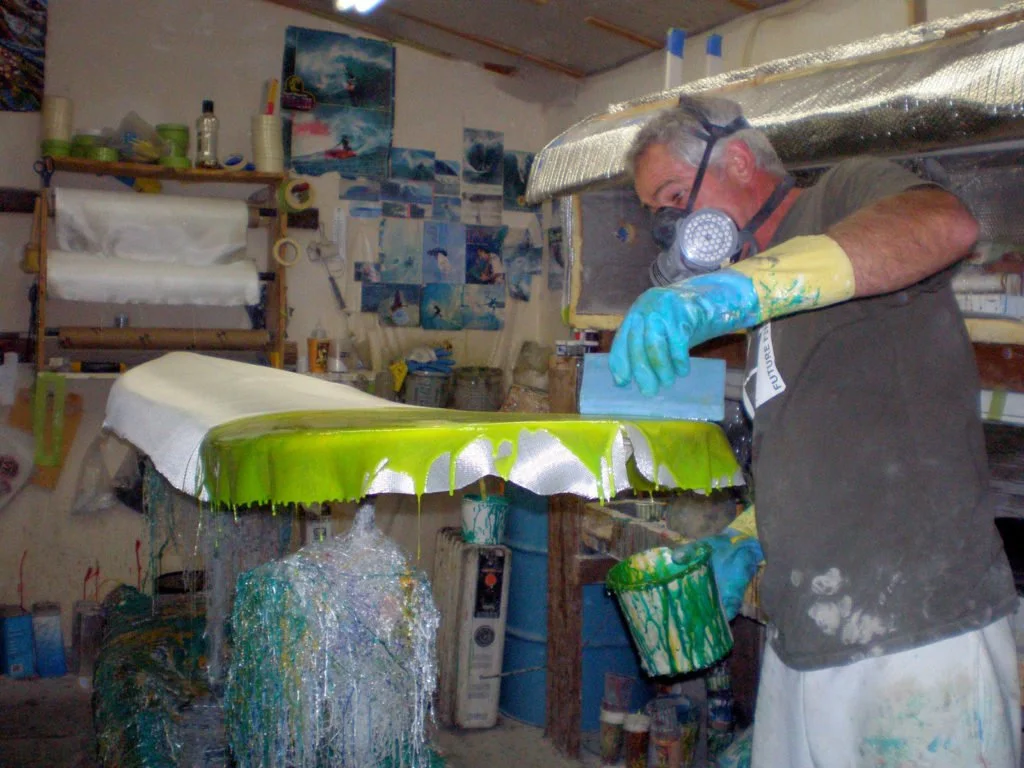 Vince Broglio shaping a custom surfboard by hand
