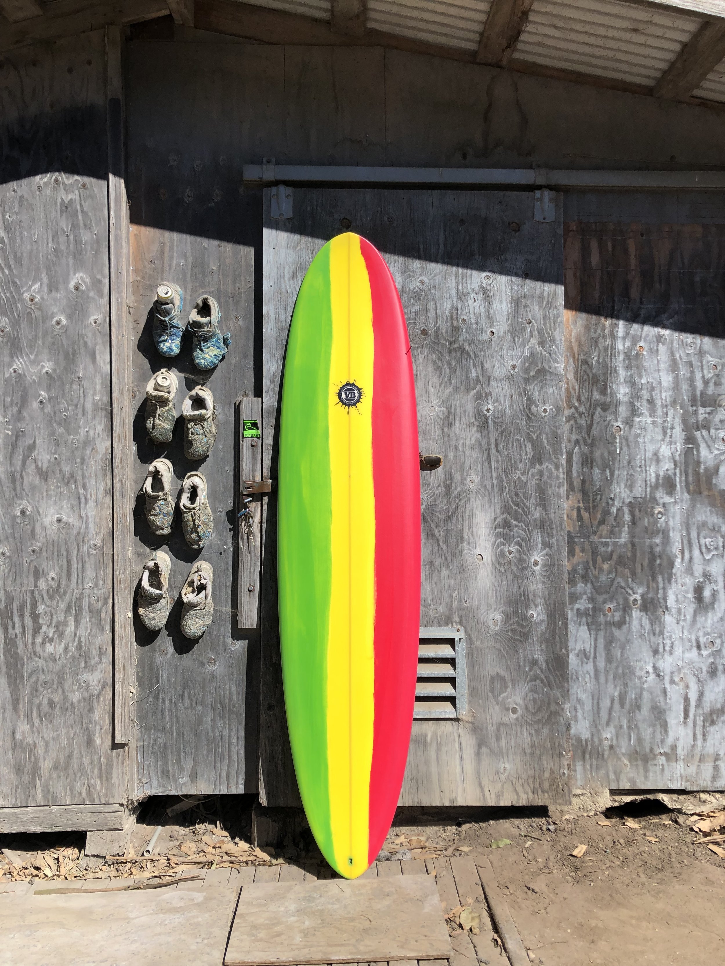 The Egg surfboard with camouflage design by Vince Broglio
